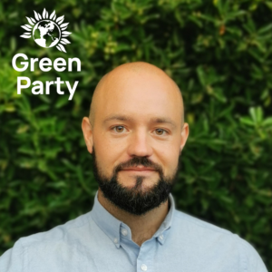 Sam Peters with Green Party logo